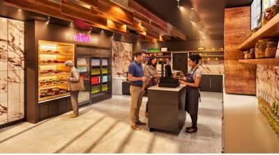 Modern food retail store interior 3D rendering with wooden ceiling panels, product display shelves, cashier counter, and customers shopping in a premium store